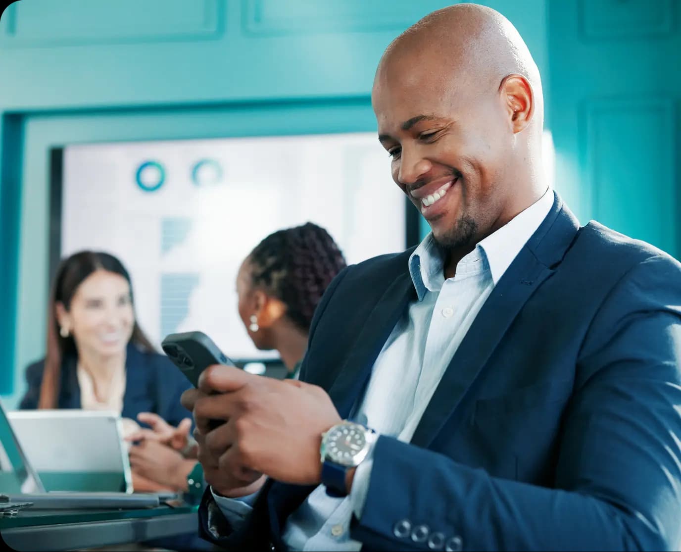 Guy smiling at phone